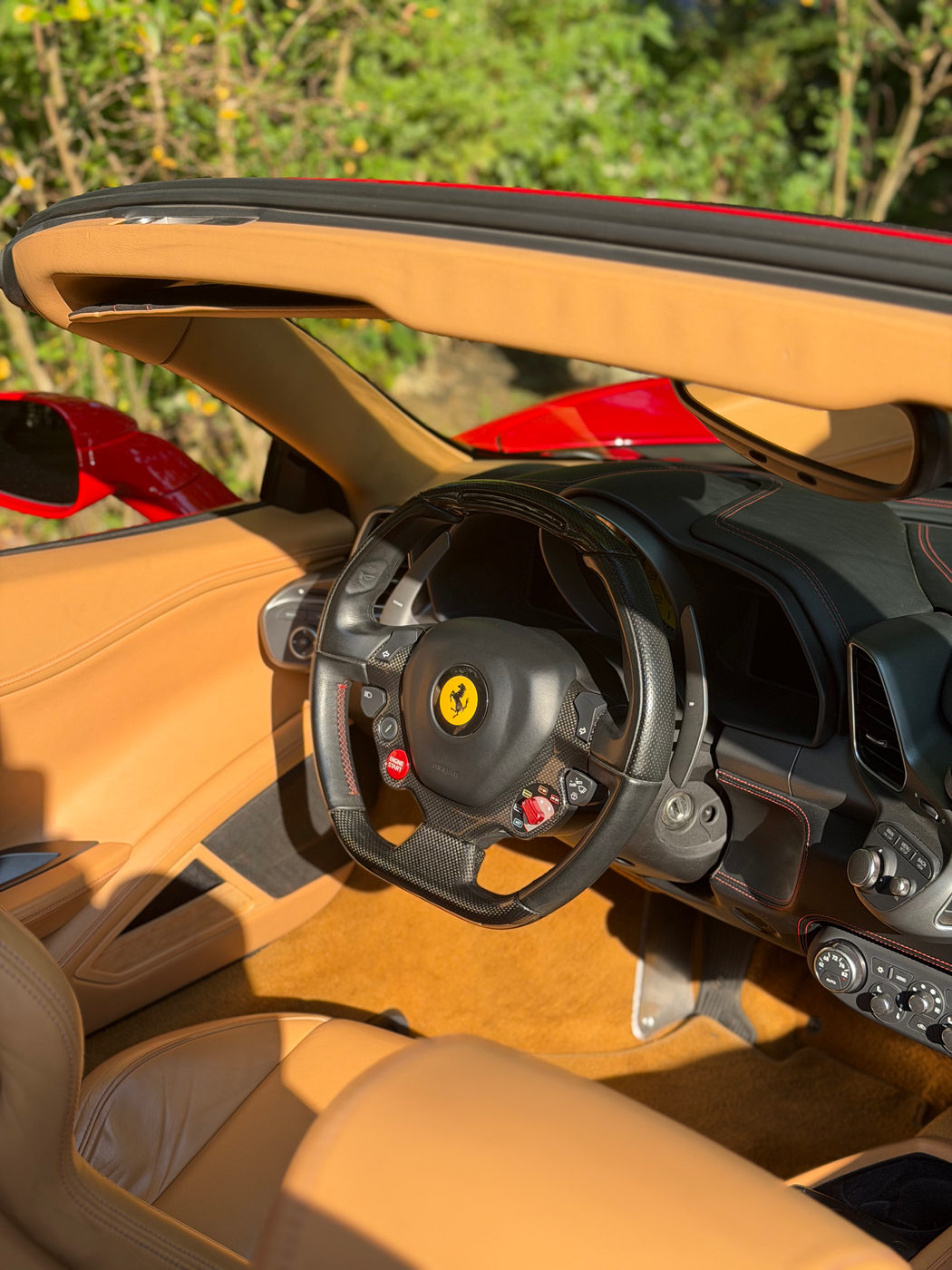Ferrari 458 Spyder tan leather interior after detailing