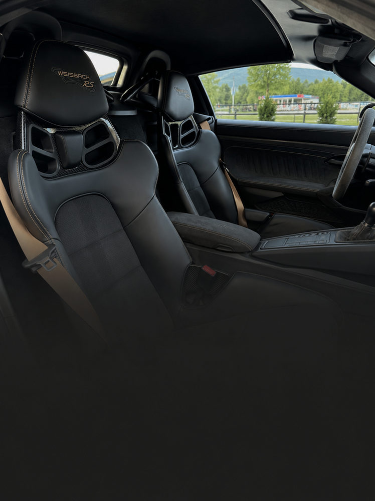 Freshly detailed sports car interior with black leather seats in Knoxville