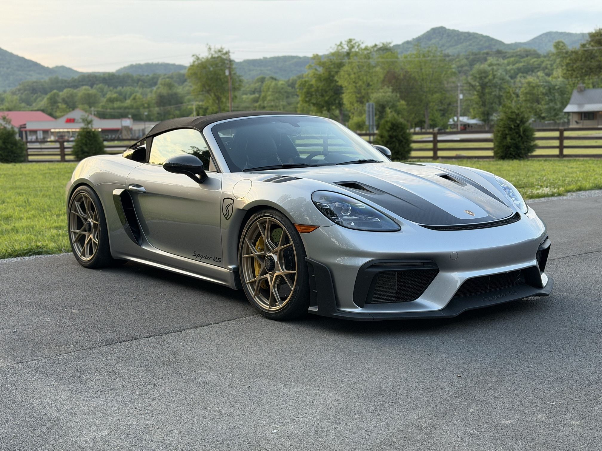 Silver Porsche 718 Spyder RS after a full detail in Knoxville